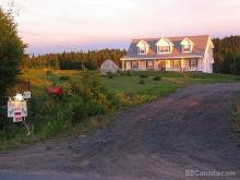 inn by the sea at sunset